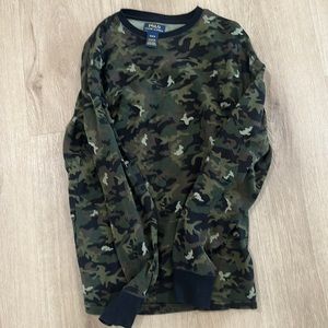 Man with medium polo by Ralph Lauren camouflage thermal, long sleeve shirt